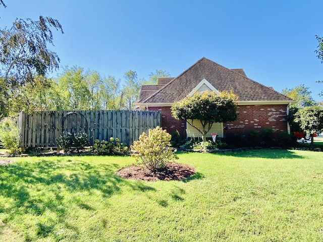 2820 Waters Edge Blvd, Joplin, MO 64801 - view of home's exterior featuring brick siding and a shingled roof