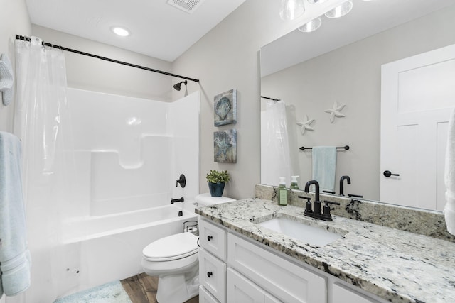 427 N Maynard Rd, Nixa, MO 65714 - bathroom with toilet, wood finished floors, shower / tub combo, and vanity