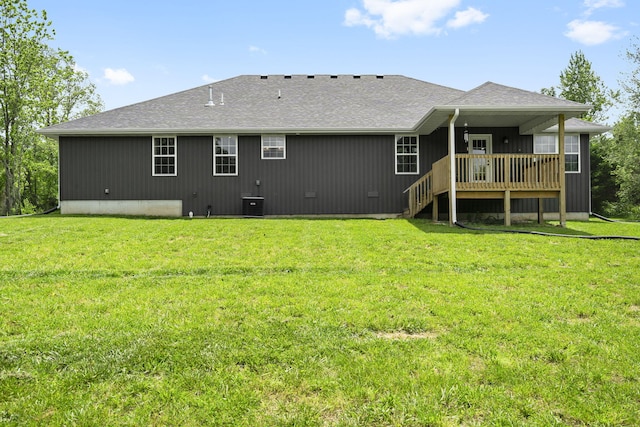 427 N Maynard Rd, Nixa, MO 65714 - back of property featuring a yard, a deck, and a shingled roof