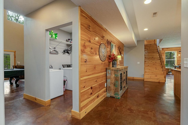 217 Victory Ln, Niangua, MO 65713 - corridor featuring finished concrete flooring, washer and clothes dryer, recessed lighting, and baseboards