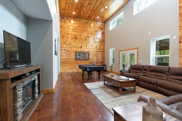 217 Victory Ln, Niangua, MO 65713 - living area featuring finished concrete flooring, a towering ceiling, recessed lighting, billiards, and wooden ceiling