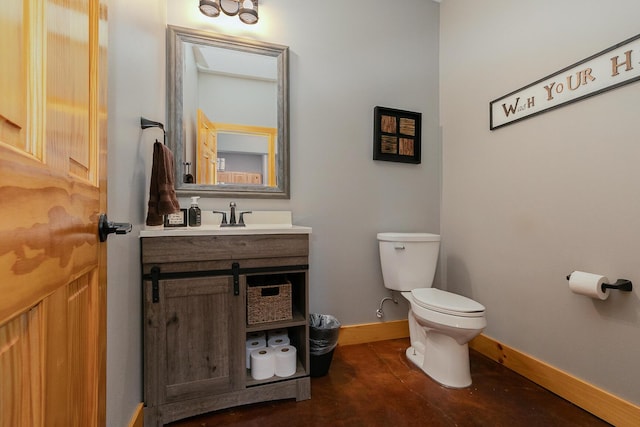 217 Victory Ln, Niangua, MO 65713 - half bathroom featuring toilet, baseboards, and vanity