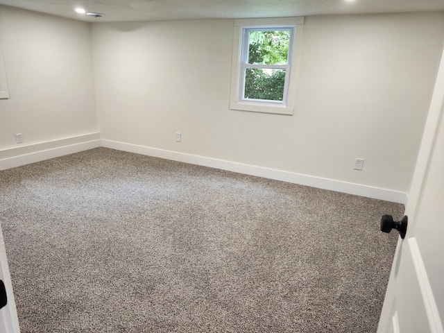 313 N Mill St, Marshfield, MO 65706 - spare room featuring carpet and baseboards