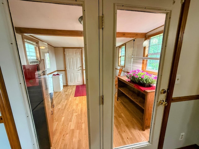 912 Domino Ct, Nixa, MO 65714 - hall featuring light wood finished floors, healthy amount of natural light, and beam ceiling
