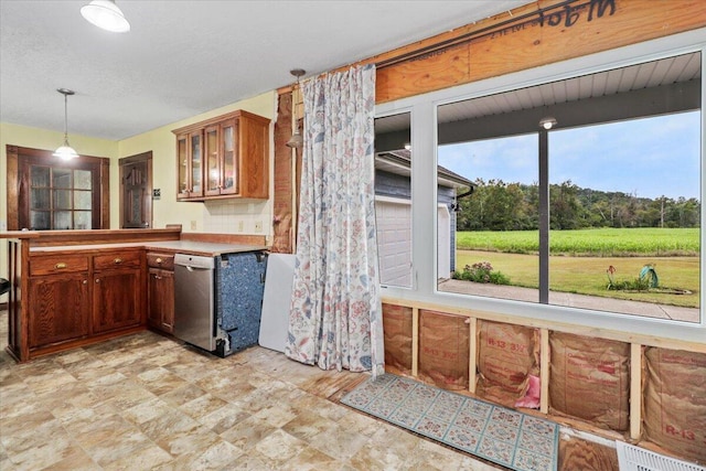 8495 Hwy N, Mountain Grove, MO 65711 - kitchen featuring stainless steel dishwasher, glass insert cabinets, decorative light fixtures, a peninsula, and brown cabinetry