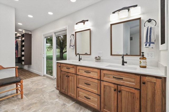 8495 Hwy N, Mountain Grove, MO 65711 - full bath with recessed lighting, double vanity, baseboards, and stone finish floors