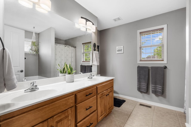 734 N Allison St, Nixa, MO 65714 - bathroom featuring baseboards, double vanity, tile patterned floors, and curtained shower