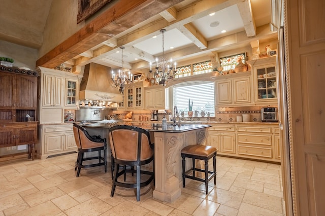 2172 E Farm Road 48, Springfield, MO 65803 - kitchen with stone tile flooring, decorative backsplash, custom exhaust hood, beam ceiling, and a chandelier