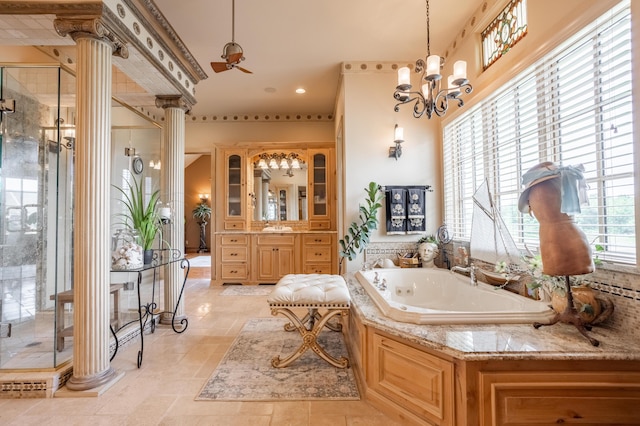 2172 E Farm Road 48, Springfield, MO 65803 - bathroom featuring ornate columns, a stall shower, a garden tub, vanity, and recessed lighting