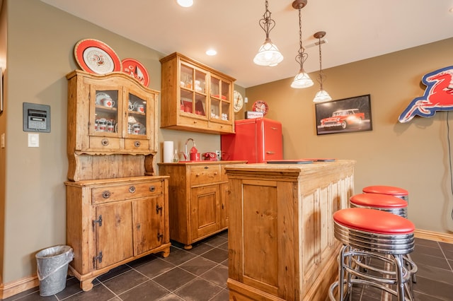 2172 E Farm Road 48, Springfield, MO 65803 - indoor dry bar featuring dark tile patterned flooring, hanging light fixtures, recessed lighting, and baseboards