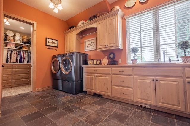 2172 E Farm Road 48, Springfield, MO 65803 - laundry room with cabinet space, washer and clothes dryer, dark stone finish flooring, and baseboards