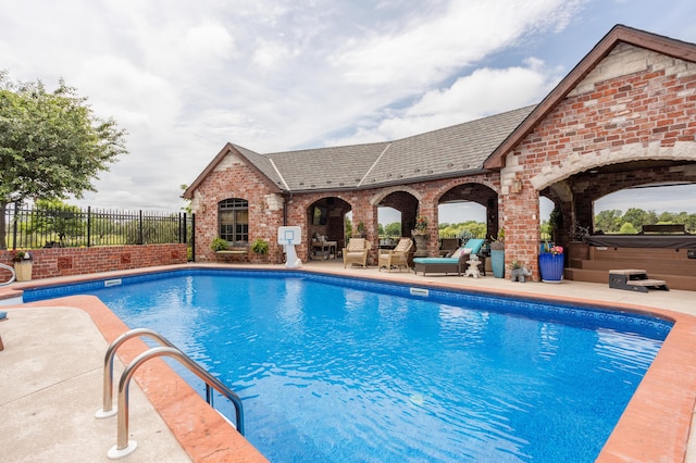2172 E Farm Road 48, Springfield, MO 65803 - view of pool with a hot tub and a patio area