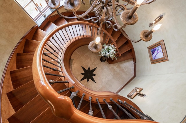 2172 E Farm Road 48, Springfield, MO 65803 - stairs with a chandelier and a towering ceiling