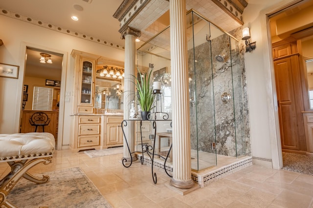 2172 E Farm Road 48, Springfield, MO 65803 - bathroom featuring decorative columns, a stall shower, vanity, and stone tile flooring