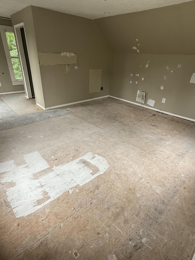 911 W Locust St, Springfield, MO 65803 - additional living space featuring vaulted ceiling