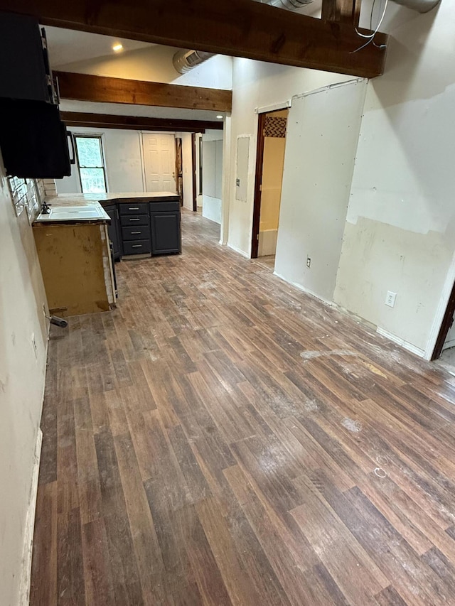 911 W Locust St, Springfield, MO 65803 - unfurnished living room with wood finished floors