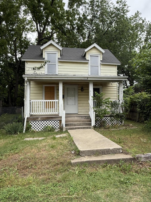 911 W Locust St, Springfield, MO 65803 - view of front of house featuring a porch and roof with shingles