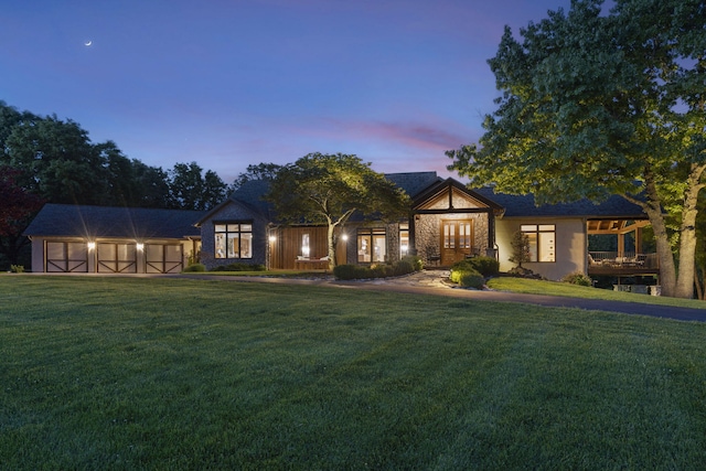 1007 Headwaters Dr, Marshfield, MO 65706 - tudor home with a yard, an outbuilding, and french doors
