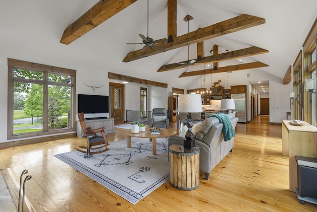 1007 Headwaters Dr, Marshfield, MO 65706 - living area with ceiling fan, high vaulted ceiling, beam ceiling, and light wood finished floors