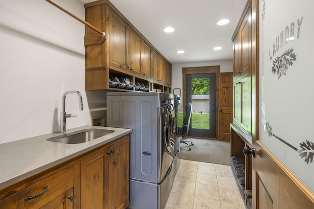 1007 Headwaters Dr, Marshfield, MO 65706 - laundry room featuring washer and clothes dryer, cabinet space, recessed lighting, and light carpet