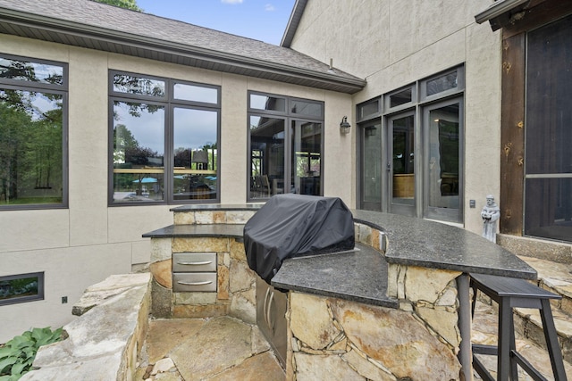1007 Headwaters Dr, Marshfield, MO 65706 - view of patio featuring an outdoor bar