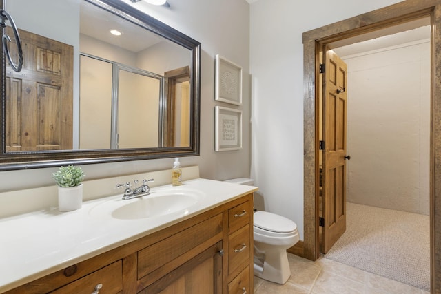 1007 Headwaters Dr, Marshfield, MO 65706 - full bath featuring toilet, a stall shower, vanity, and tile patterned floors