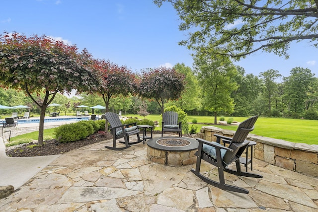 1007 Headwaters Dr, Marshfield, MO 65706 - view of patio with an outdoor fire pit and an outdoor pool