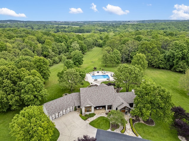1007 Headwaters Dr, Marshfield, MO 65706 - aerial view of property and surrounding area with a forest and a pool