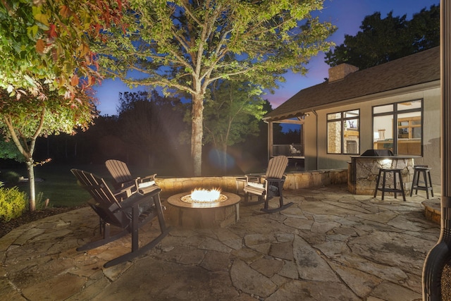 1007 Headwaters Dr, Marshfield, MO 65706 - view of patio / terrace featuring an outdoor fire pit