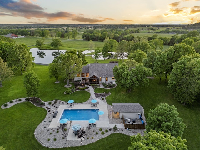 1007 Headwaters Dr, Marshfield, MO 65706 - aerial view at dusk of a water view and view of pool