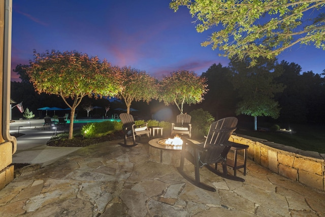 1007 Headwaters Dr, Marshfield, MO 65706 - view of patio with a fire pit and an outdoor pool