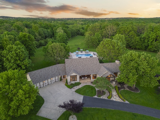 1007 Headwaters Dr, Marshfield, MO 65706 - aerial view at dusk of a view of trees