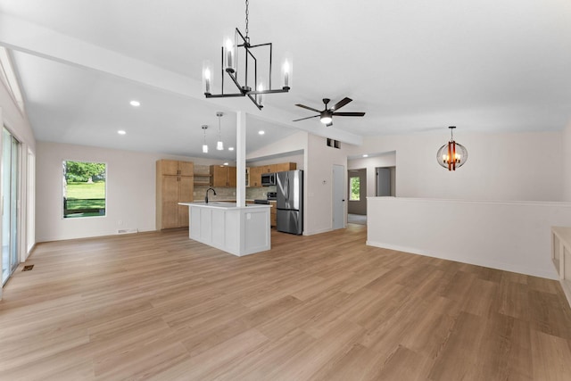 25609 Hillcrest Dr, Shell Knob, MO 65747 - unfurnished living room with a chandelier, vaulted ceiling, light wood-style flooring, recessed lighting, and a sink