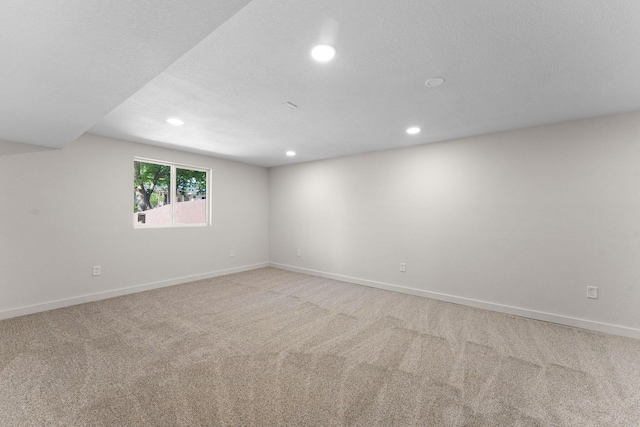 25609 Hillcrest Dr, Shell Knob, MO 65747 - spare room with recessed lighting, baseboards, and light carpet