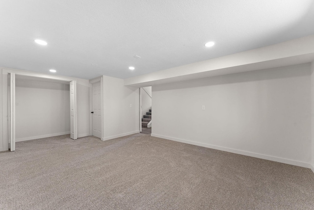 25609 Hillcrest Dr, Shell Knob, MO 65747 - finished below grade area featuring recessed lighting, light colored carpet, stairway, and baseboards