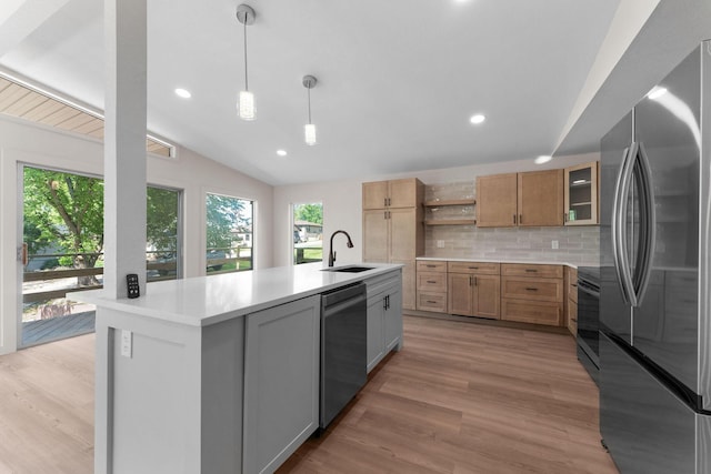 25609 Hillcrest Dr, Shell Knob, MO 65747 - kitchen with appliances with stainless steel finishes, a sink, open shelves, healthy amount of natural light, and lofted ceiling