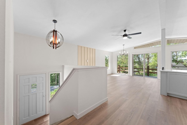 25609 Hillcrest Dr, Shell Knob, MO 65747 - entryway with a chandelier, light wood-type flooring, a ceiling fan, and vaulted ceiling