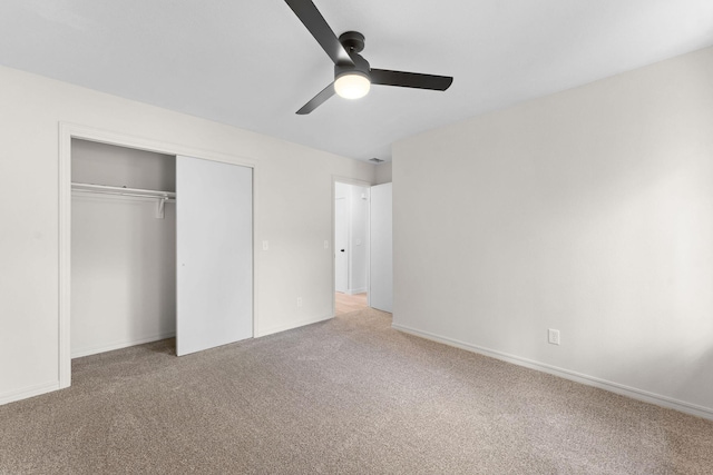 25609 Hillcrest Dr, Shell Knob, MO 65747 - unfurnished bedroom with carpet, a closet, ceiling fan, and baseboards