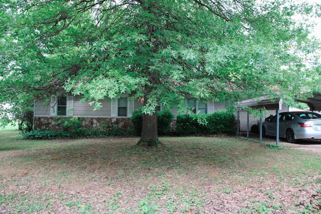 9 Carte Sq, West Plains, MO 65775 - view of front facade with stone siding and a carport