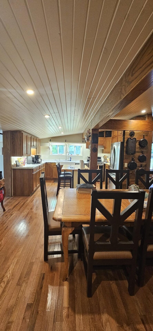 182 Cathy St, Branson, MO 65616 - dining space featuring light wood-type flooring and wooden walls