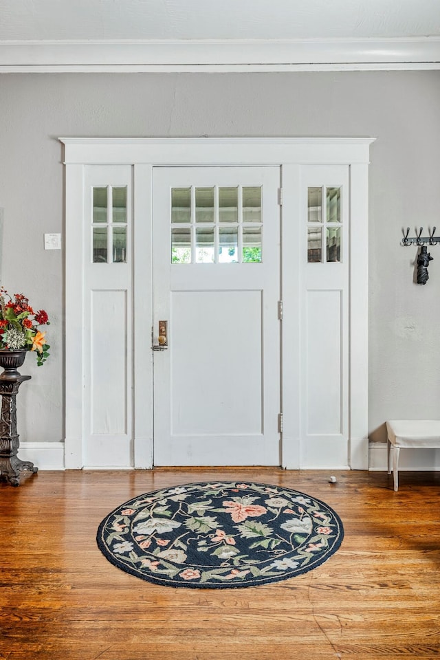 1200 E Walnut St, Springfield, MO 65802 - foyer entrance with wood finished floors and ornamental molding