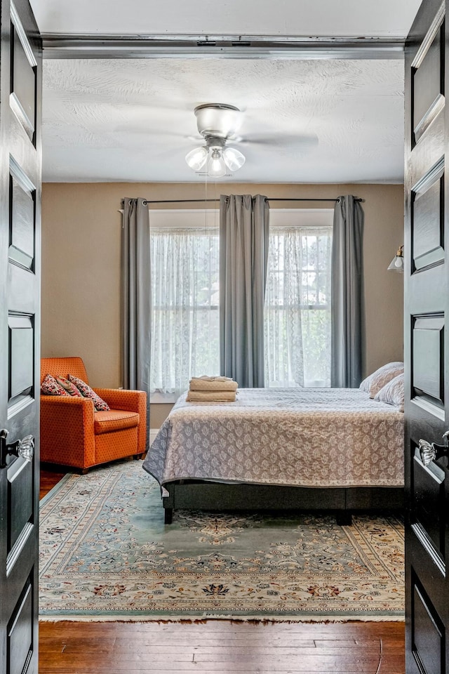 1200 E Walnut St, Springfield, MO 65802 - bedroom featuring hardwood / wood-style floors