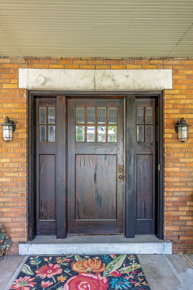 1200 E Walnut St, Springfield, MO 65802 - view of exterior entry with brick siding
