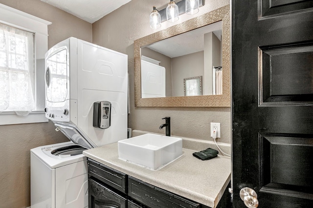 1200 E Walnut St, Springfield, MO 65802 - bathroom featuring a textured wall and vanity