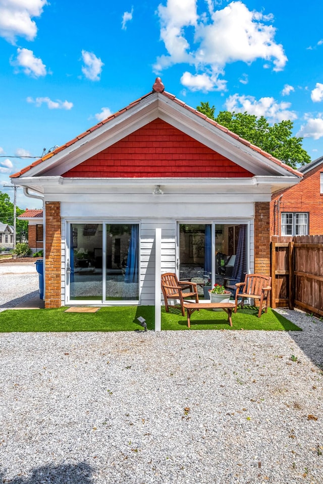 1200 E Walnut St, Springfield, MO 65802 - back of property with a patio area