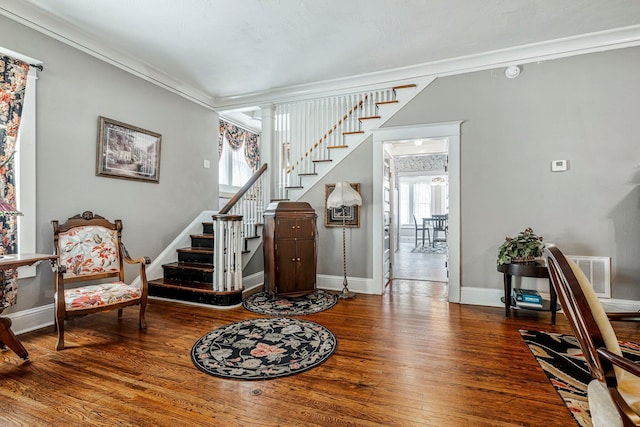 1200 E Walnut St, Springfield, MO 65802 - foyer featuring hardwood / wood-style flooring, stairway, baseboards, and crown molding