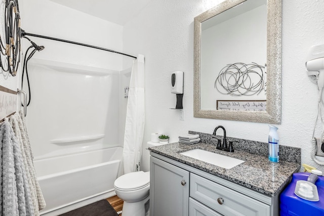 1200 E Walnut St, Springfield, MO 65802 - bathroom with shower / bath combo with shower curtain, vanity, toilet, and wood finished floors