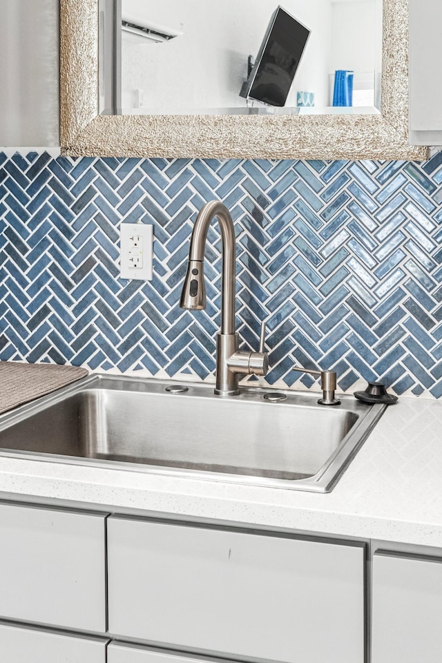 1200 E Walnut St, Springfield, MO 65802 - bathroom with a sink and backsplash