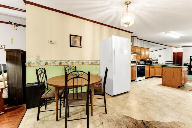 1161 State Highway 176, Rockaway Beach, MO 65740 - dining room with crown molding and light stone finish flooring