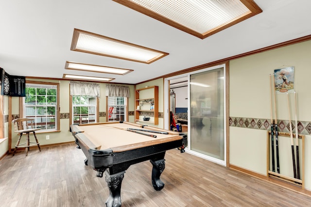 1161 State Highway 176, Rockaway Beach, MO 65740 - playroom with crown molding, billiards table, light wood-style floors, and baseboards